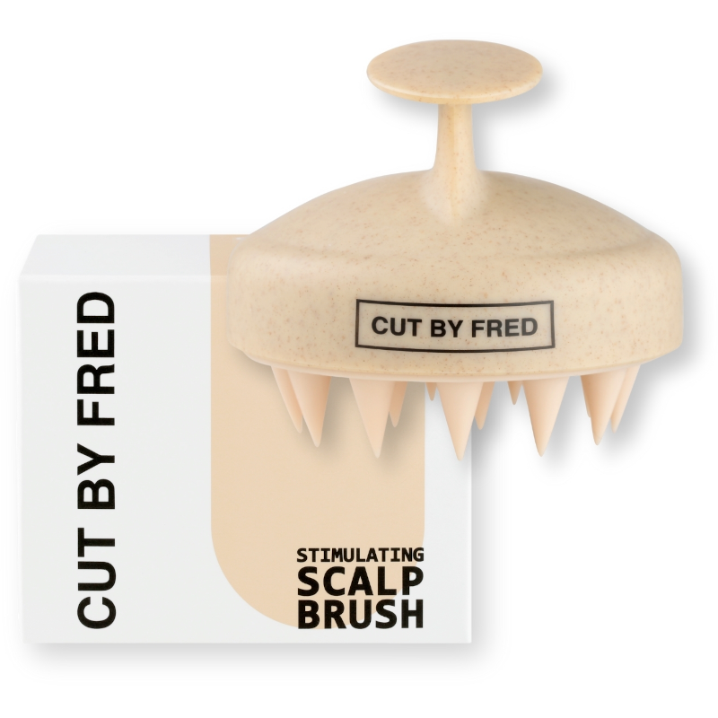 Brosse stimulante pour cuir chevelu